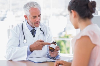 Woman Consulting Doctor