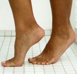 Feet in the Shower Room