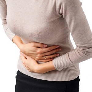 Woman having stomach pain