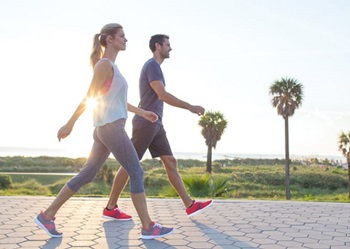 Healthy Couple Walking Outdoors