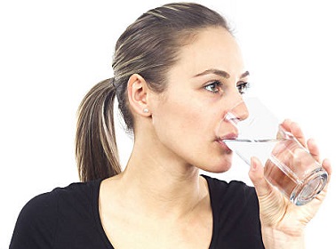 Woman Drinking Glass of Water